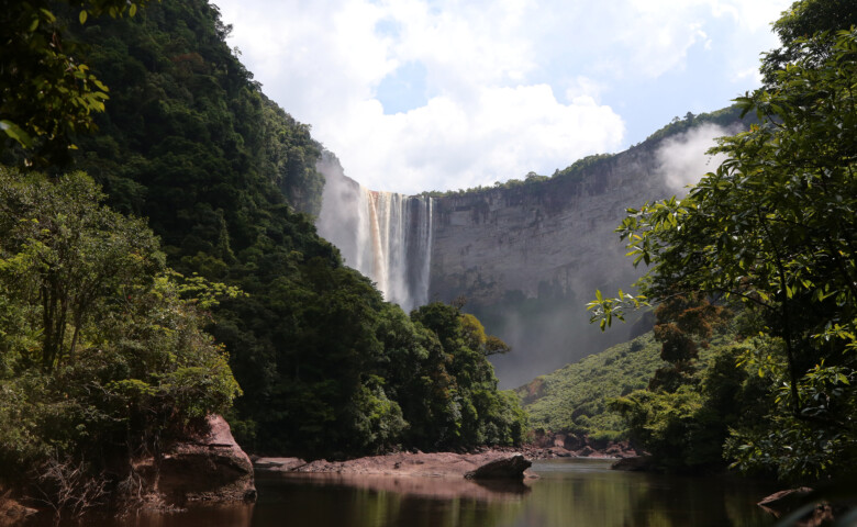 Kaieteur Falls is one of the most powerful single-drop waterfalls in the world. It is located on the Potaro River in Kaieteur National Park, central Essequibo Territory, Guyana. It is 226 metres (741 ft) high when measured from its plunge over a sandstone and conglomerate cliff to the first break. It then flows over a series of steep cascades that, when included in the measurements, bring the total height to 251 metres (822 ft). While many falls have greater height or greater flow, few have the combination of height and water volume, and Kaieteur is among the most powerful waterfalls in the world with an average flow rate of 663 cubic meters per second (23,400 cubic feet per second).